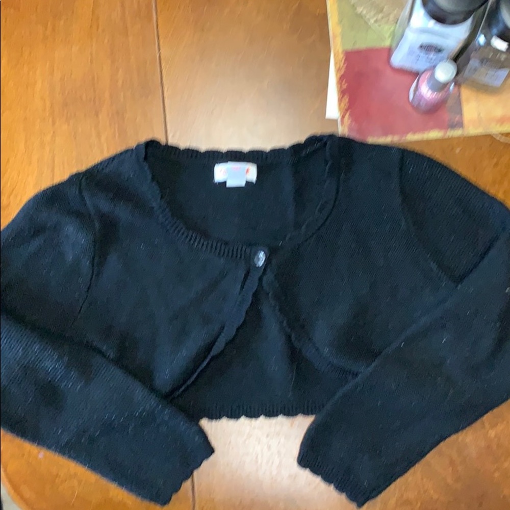 Girls wrap sweater w/ sparky accents.